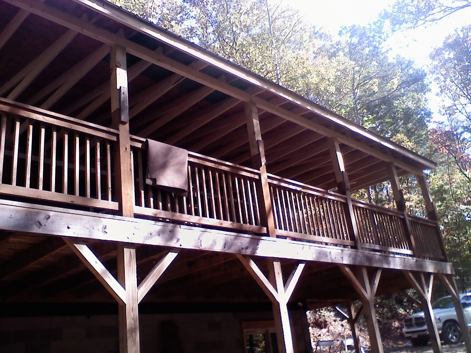 Timber framing under a new elevated porch and deck — Roof Leak Repair in La Follette by Roofing Brothers